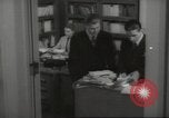 Image of man and woman work in office Washington DC USA, 1940, second 55 stock footage video 65675064156