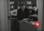Image of man and woman work in office Washington DC USA, 1940, second 56 stock footage video 65675064156