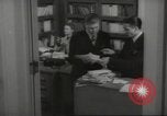Image of man and woman work in office Washington DC USA, 1940, second 57 stock footage video 65675064156