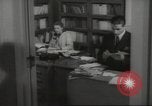 Image of man and woman work in office Washington DC USA, 1940, second 61 stock footage video 65675064156