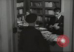 Image of man and woman work in office Washington DC USA, 1940, second 62 stock footage video 65675064156