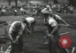 Immagine di Lavoratori trincea di scavo Londra Inghilterra Regno Unito, 1938, secondo 23 filmato di repertorio 65675064221