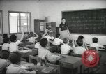 Image of Jewish children receiving instruction at Bialik Hebrew Day School Palestine, 1945, second 10 stock footage video 65675064275