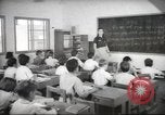 Image of Jewish children receiving instruction at Bialik Hebrew Day School Palestine, 1945, second 14 stock footage video 65675064275