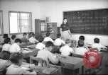 Image of Jewish children receiving instruction at Bialik Hebrew Day School Palestine, 1945, second 15 stock footage video 65675064275