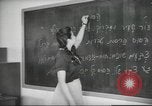 Image of Jewish children receiving instruction at Bialik Hebrew Day School Palestine, 1945, second 19 stock footage video 65675064275