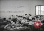 Image of Jewish children receiving instruction at Bialik Hebrew Day School Palestine, 1945, second 30 stock footage video 65675064275