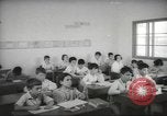 Image of Jewish children receiving instruction at Bialik Hebrew Day School Palestine, 1945, second 32 stock footage video 65675064275