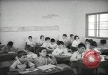 Image of Jewish children receiving instruction at Bialik Hebrew Day School Palestine, 1945, second 34 stock footage video 65675064275