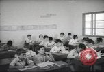 Image of Jewish children receiving instruction at Bialik Hebrew Day School Palestine, 1945, second 36 stock footage video 65675064275