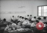 Image of Jewish children receiving instruction at Bialik Hebrew Day School Palestine, 1945, second 37 stock footage video 65675064275