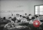 Image of Jewish children receiving instruction at Bialik Hebrew Day School Palestine, 1945, second 40 stock footage video 65675064275