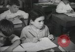 Image of Jewish children receiving instruction at Bialik Hebrew Day School Palestine, 1945, second 43 stock footage video 65675064275