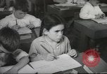 Image of Jewish children receiving instruction at Bialik Hebrew Day School Palestine, 1945, second 44 stock footage video 65675064275