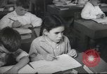 Image of Jewish children receiving instruction at Bialik Hebrew Day School Palestine, 1945, second 45 stock footage video 65675064275