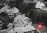 Image of Jewish children receiving instruction at Bialik Hebrew Day School Palestine, 1945, second 46 stock footage video 65675064275