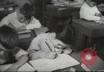 Image of Jewish children receiving instruction at Bialik Hebrew Day School Palestine, 1945, second 47 stock footage video 65675064275