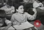 Image of Jewish children receiving instruction at Bialik Hebrew Day School Palestine, 1945, second 54 stock footage video 65675064275