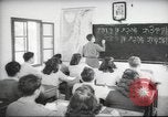 Image of Jewish children receiving instruction at Bialik Hebrew Day School Palestine, 1945, second 57 stock footage video 65675064275