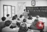 Image of Jewish children receiving instruction at Bialik Hebrew Day School Palestine, 1945, second 58 stock footage video 65675064275