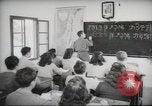 Image of Jewish children receiving instruction at Bialik Hebrew Day School Palestine, 1945, second 59 stock footage video 65675064275