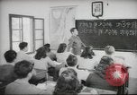 Image of Jewish children receiving instruction at Bialik Hebrew Day School Palestine, 1945, second 60 stock footage video 65675064275