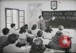 Image of Jewish children receiving instruction at Bialik Hebrew Day School Palestine, 1945, second 61 stock footage video 65675064275