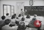 Image of Jewish children receiving instruction at Bialik Hebrew Day School Palestine, 1945, second 62 stock footage video 65675064275