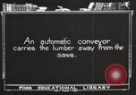 Image of lumber industry United States USA, 1920, second 56 stock footage video 65675064425