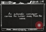 Image of lumber industry United States USA, 1920, second 60 stock footage video 65675064425