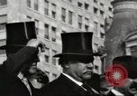 Image of President Woodrow Wilson wearing  top hat in an open car United States USA, 1916, second 3 stock footage video 65675064461