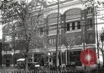 Image of An automobile almost hits pedestrians in center of a road Michigan United States USA, 1916, second 3 stock footage video 65675064462