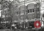 Image of An automobile almost hits pedestrians in center of a road Michigan United States USA, 1916, second 4 stock footage video 65675064462