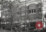 Image of An automobile almost hits pedestrians in center of a road Michigan United States USA, 1916, second 6 stock footage video 65675064462