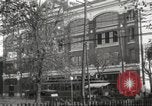 Image of An automobile almost hits pedestrians in center of a road Michigan United States USA, 1916, second 7 stock footage video 65675064462