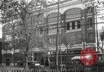 Image of An automobile almost hits pedestrians in center of a road Michigan United States USA, 1916, second 8 stock footage video 65675064462