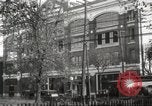Image of An automobile almost hits pedestrians in center of a road Michigan United States USA, 1916, second 9 stock footage video 65675064462