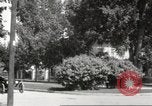 Image of An automobile almost hits pedestrians in center of a road Michigan United States USA, 1916, second 40 stock footage video 65675064462