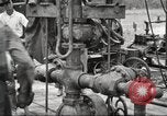 Image of Oil well in 1920s America United States USA, 1920, second 8 stock footage video 65675064496