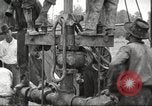 Image of Oil well in 1920s America United States USA, 1920, second 12 stock footage video 65675064496