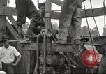 Image of Oil well in 1920s America United States USA, 1920, second 14 stock footage video 65675064496