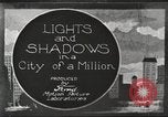 Image of Lights and Shadows in a city of Millions Detroit Michigan USA, 1919, second 1 stock footage video 65675064498