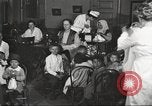 Image of teaching skills to American immigrants in early 1900s Detroit Michigan USA, 1919, second 7 stock footage video 65675064500