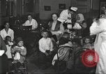 Image of teaching skills to American immigrants in early 1900s Detroit Michigan USA, 1919, second 8 stock footage video 65675064500