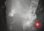 Image of building on fire London England United Kingdom, 1939, second 14 stock footage video 65675064530