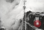 Image of building on fire London England United Kingdom, 1939, second 18 stock footage video 65675064530