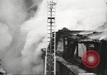 Image of building on fire London England United Kingdom, 1939, second 19 stock footage video 65675064530
