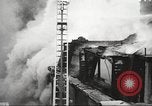 Image of building on fire London England United Kingdom, 1939, second 20 stock footage video 65675064530