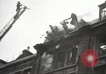 Image of building on fire London England United Kingdom, 1939, second 22 stock footage video 65675064530
