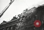 Image of building on fire London England United Kingdom, 1939, second 23 stock footage video 65675064530